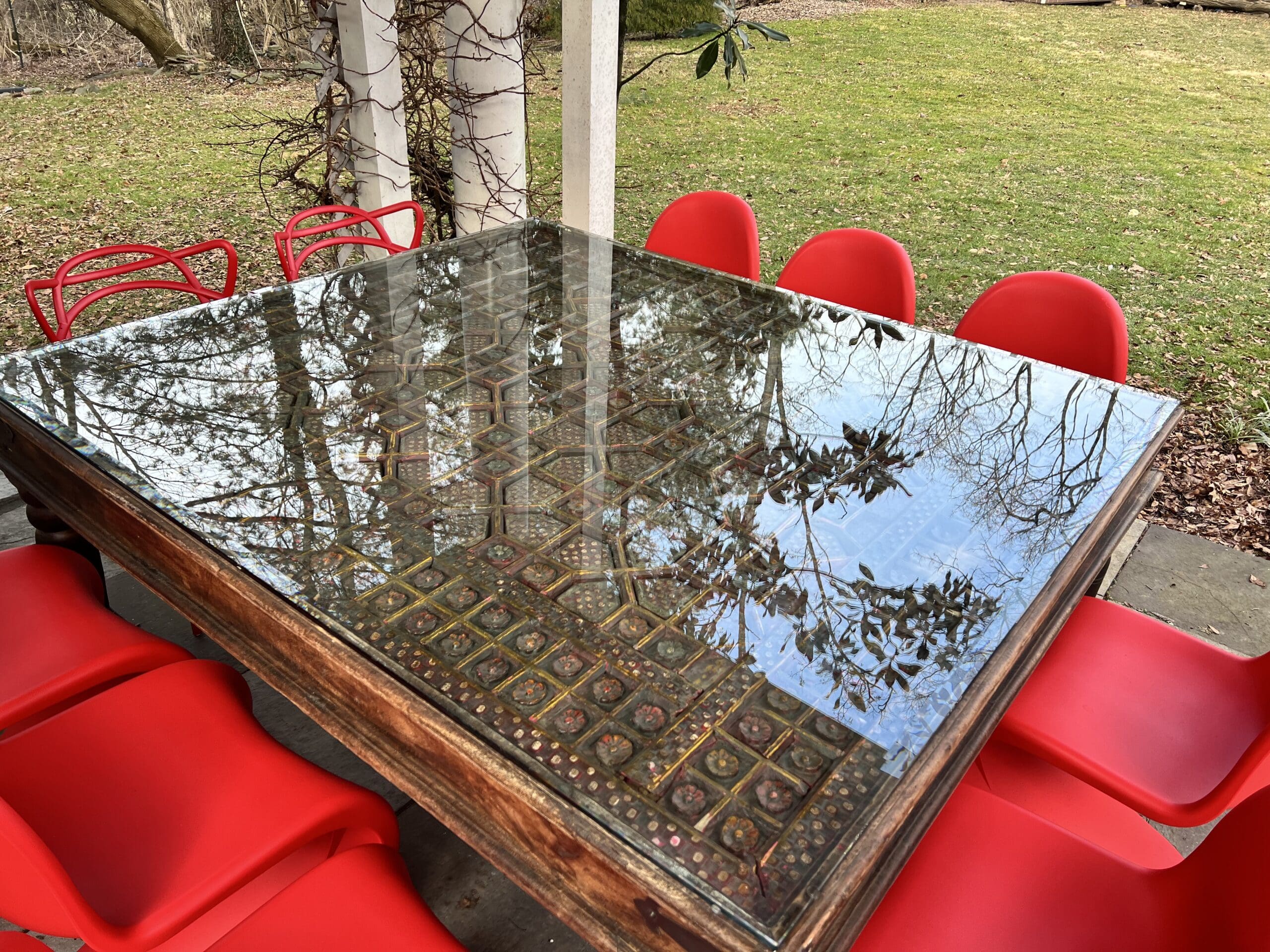 Large table outside under a pergola